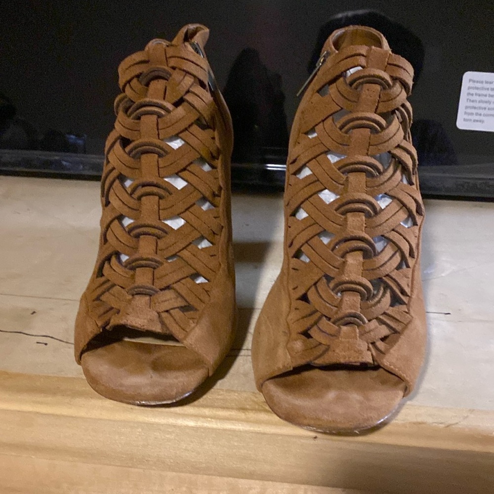Open toe booties, brown suede, worn several times, but still in good condition.